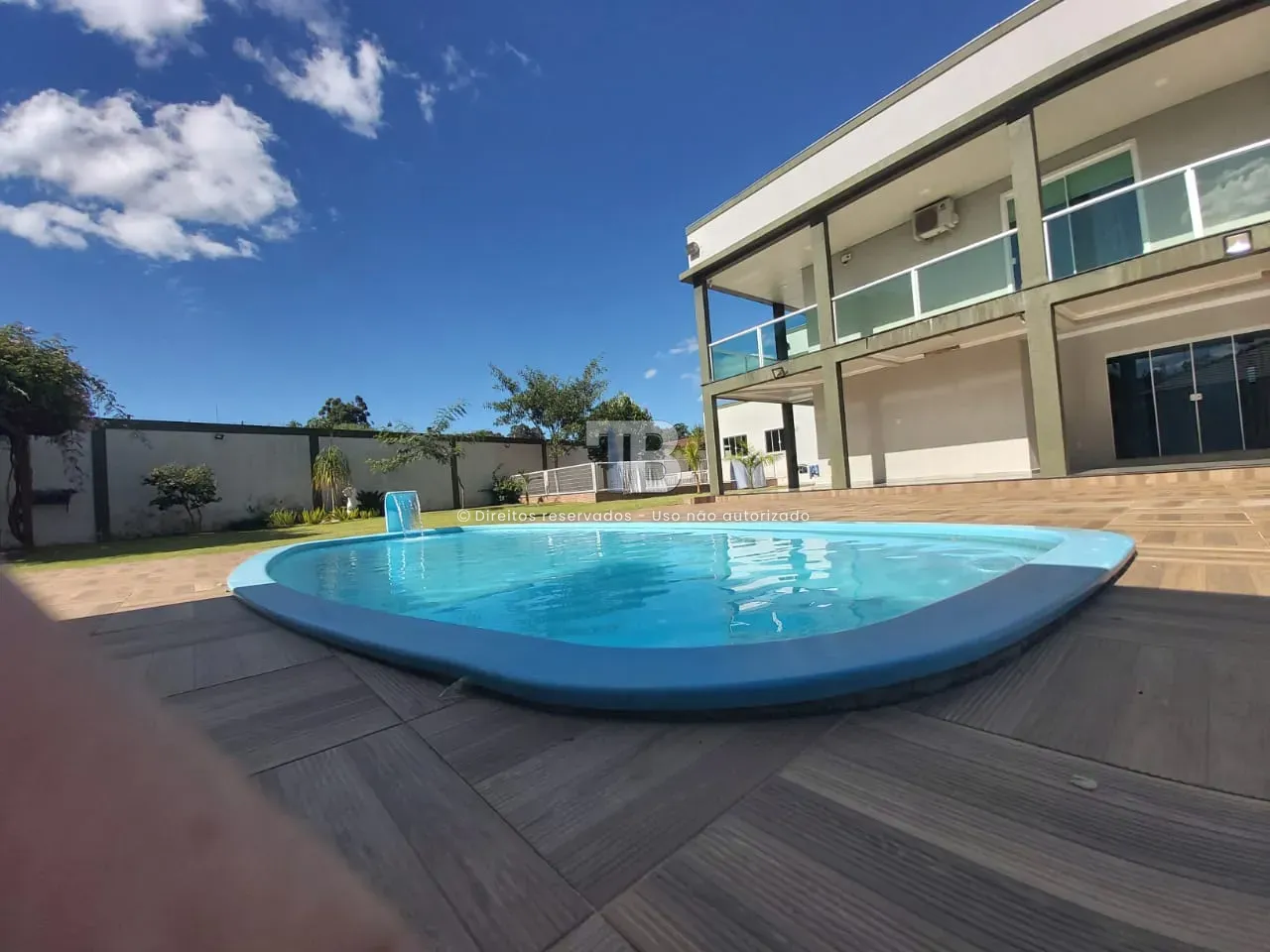 Casa à venda com 4 dormitórios, 5 banheiros, 10 vagas de garagens e 572m² de área privativa no bairro Zona Rural