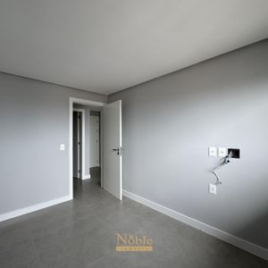 Apartamento com 77m², 2 dormitórios, 1 suíte, 2 vagas no Maui Residencial em Torres para Comprar