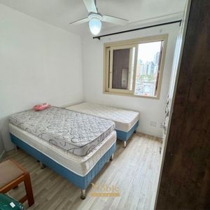 Apartamento com 65m², 2 dormitórios, 1 vaga no Edifício Porto Seguro em Torres para Comprar