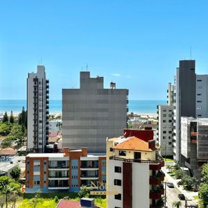 Apartamento com 104m², 3 dormitórios, 1 suíte, 2 vagas no Ibiza em Torres para Comprar