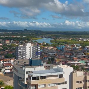 Apartamento com 97m², 2 dormitórios, 2 suítes, 2 vagas no Origem em Torres para Comprar