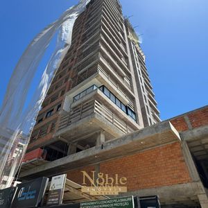 Apartamento com 108m², 3 dormitórios, 1 suíte, 2 vagas no Sun Haus em Torres para Comprar