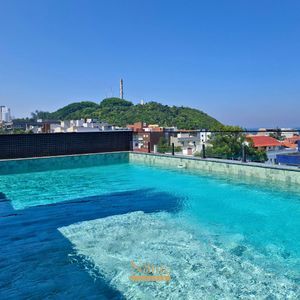 Apartamento com 74m², 2 dormitórios, 1 suíte, 1 vaga no Residencial Acrópole em Torres para Comprar