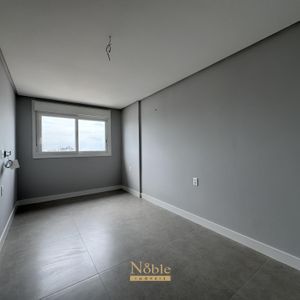 Apartamento com 108m², 3 dormitórios, 1 suíte, 2 vagas no Maui Residencial em Torres para Comprar