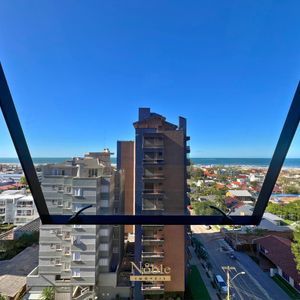 Apartamento com 82m², 2 dormitórios, 1 suíte, 1 vaga no Verano em Torres para Comprar