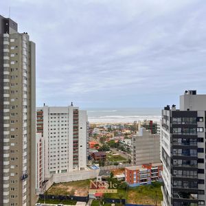 Apartamento com 91m², 2 dormitórios, 2 suítes, 2 vagas no Toronto em Torres para Comprar