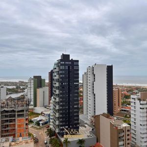 Apartamento com 91m², 2 dormitórios, 2 suítes, 2 vagas no Toronto em Torres para Comprar