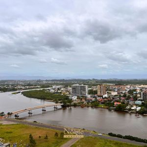 Apartamento com 91m², 2 dormitórios, 2 suítes, 2 vagas no Toronto em Torres para Comprar