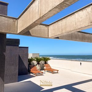 Apartamento com 74m², 2 dormitórios, 1 suíte, 2 vagas no Essenza em Torres para Comprar