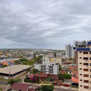 Apartamento com 91m², 2 dormitórios, 2 suítes, 2 vagas no Toronto em Torres para Comprar