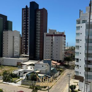 Apartamento com 108m², 3 dormitórios, 1 suíte, 2 vagas no Sun Haus em Torres para Comprar