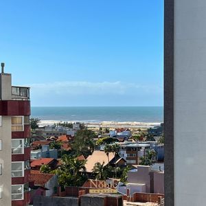 Apartamento com 114m², 3 dormitórios, 1 suíte, 2 vagas no Vista Mare em Torres para Comprar