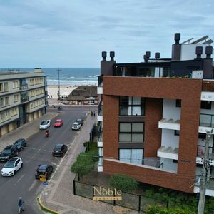 Apartamento com 78m², 2 dormitórios, 1 suíte, 2 vagas no Residencial DI Capri em Torres para Comprar