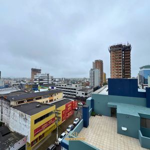 Apartamento com 91m², 2 dormitórios, 1 suíte, 1 vaga no Ed. Fenix Center em Torres para Comprar
