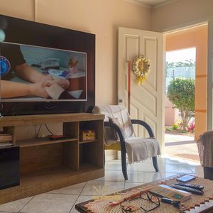 Casa com 180m², 5 dormitórios, 1 suíte, 2 vagas no bairro Praia da Cal em Torres para Comprar