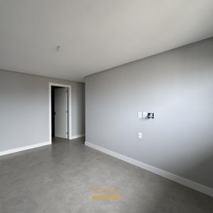 Apartamento com 108m², 3 dormitórios, 1 suíte, 2 vagas no Maui Residencial em Torres para Comprar