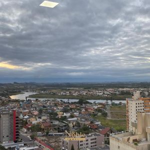 Apartamento com 103m², 3 dormitórios, 3 suítes, 2 vagas no Absoluto em Torres para Comprar