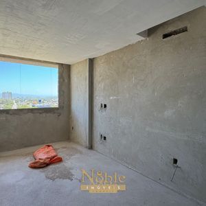 Apartamento com 108m², 3 dormitórios, 1 suíte, 2 vagas no Sun Haus em Torres para Comprar