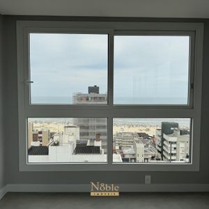 Apartamento com 77m², 2 dormitórios, 1 suíte, 2 vagas no Maui Residencial em Torres para Comprar