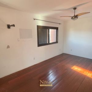 Apartamento com 140m², 3 dormitórios, 1 suíte, 1 vaga no Edificio Clezar em Torres para Comprar