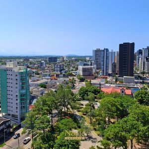 Apartamento com 76m², 2 dormitórios, 1 suíte, 2 vagas no Vesta em Torres para Comprar