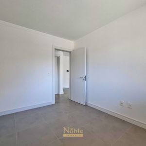 Apartamento com 74m², 2 dormitórios, 1 suíte, 1 vaga no Residencial Acrópole em Torres para Comprar