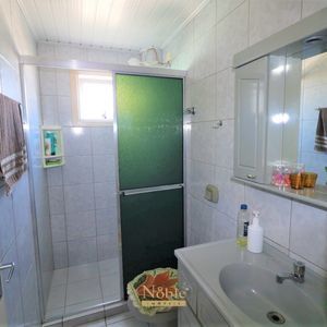 Apartamento com 53m², 2 dormitórios, 1 vaga no Condomínio Justo em Torres para Comprar