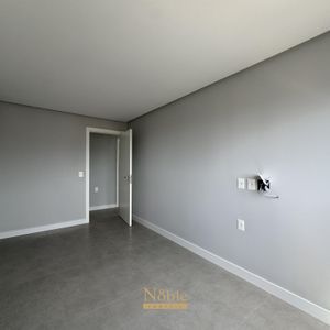 Apartamento com 108m², 3 dormitórios, 1 suíte, 2 vagas no Maui Residencial em Torres para Comprar