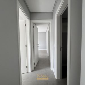 Apartamento com 90m², 2 dormitórios, 2 suítes, 2 vagas no Maui Residencial em Torres para Comprar