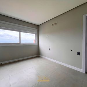 Apartamento com 91m², 2 dormitórios, 2 suítes, 2 vagas no Toronto em Torres para Comprar