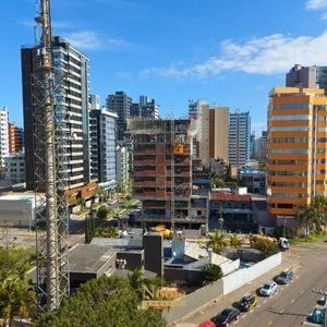 Apartamento com 131m², 3 dormitórios, 1 suíte, 2 vagas no Torre do Sol em Torres para Comprar