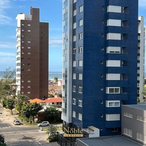 Apartamento com 110m², 3 dormitórios, 1 suíte, 2 vagas no LONDON em Torres para Comprar