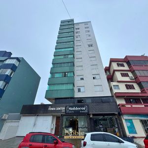 Apartamento com 91m², 2 dormitórios, 1 suíte, 1 vaga no Ed. Fenix Center em Torres para Comprar