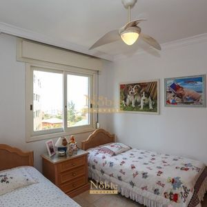 Apartamento com 121m², 3 dormitórios, 1 suíte, 1 vaga no Ile de France em Torres para Comprar