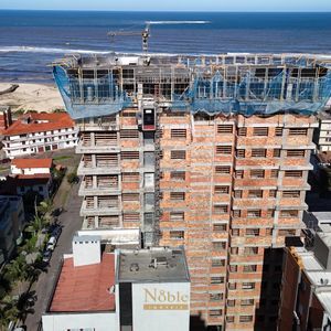 Apartamento com 122m², 3 dormitórios, 1 suíte, 2 vagas no Boreal em Torres para Comprar