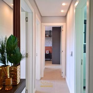 Apartamento com 106m², 3 dormitórios, 1 suíte, 2 vagas no Essenza em Torres para Comprar