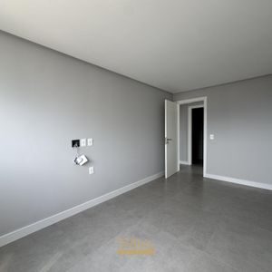 Apartamento com 108m², 3 dormitórios, 1 suíte, 2 vagas no Maui Residencial em Torres para Comprar