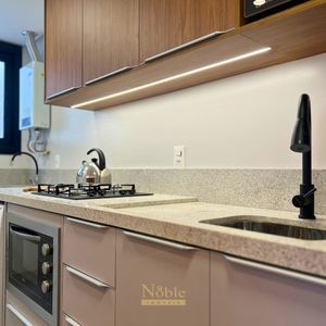 Apartamento com 71m², 2 dormitórios, 1 suíte, 2 vagas no Residencial DI Capri em Torres para Comprar