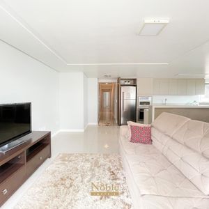 Apartamento com 124m², 3 dormitórios, 3 suítes, 2 vagas no Lê Classic em Torres para Comprar