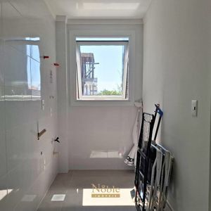 Apartamento com 74m², 2 dormitórios, 1 suíte, 1 vaga no Residencial Acrópole em Torres para Comprar