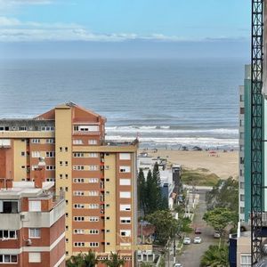 Apartamento com 100m², 2 dormitórios, 2 suítes, 2 vagas no Origem em Torres para Comprar