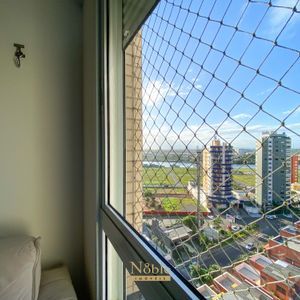 Apartamento com 120m², 4 dormitórios, 1 suíte, 2 vagas no Michelângelo em Torres para Comprar