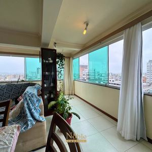 Apartamento com 91m², 2 dormitórios, 1 suíte, 1 vaga no Ed. Fenix Center em Torres para Comprar