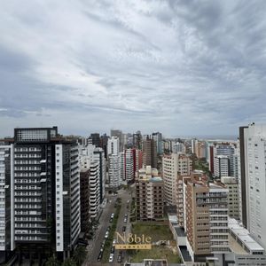 Apartamento com 108m², 3 dormitórios, 1 suíte, 2 vagas no Maui Residencial em Torres para Comprar