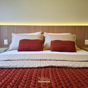 Apartamento com 77m², 2 dormitórios, 1 suíte, 2 vagas no Maui Residencial em Torres para Comprar