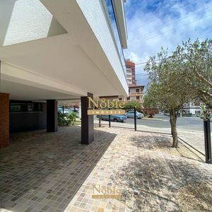 Apartamento com 71m², 2 dormitórios, 1 suíte, 2 vagas no Residencial DI Capri em Torres para Comprar