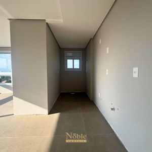 Apartamento com 70m², 2 dormitórios, 1 suíte, 1 vaga no Topazio em Torres para Comprar