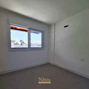 Apartamento com 74m², 2 dormitórios, 1 suíte, 1 vaga no Residencial Acrópole em Torres para Comprar