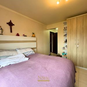 Apartamento com 91m², 2 dormitórios, 1 suíte, 1 vaga no Ed. Fenix Center em Torres para Comprar