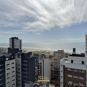 Apartamento com 90m², 2 dormitórios, 2 suítes, 2 vagas no Maui Residencial em Torres para Comprar